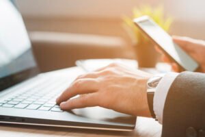 office desktop with laptop business man